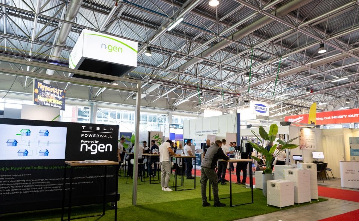 Energy stands in Hall K, with a Tesla Powerwall display in the foreground