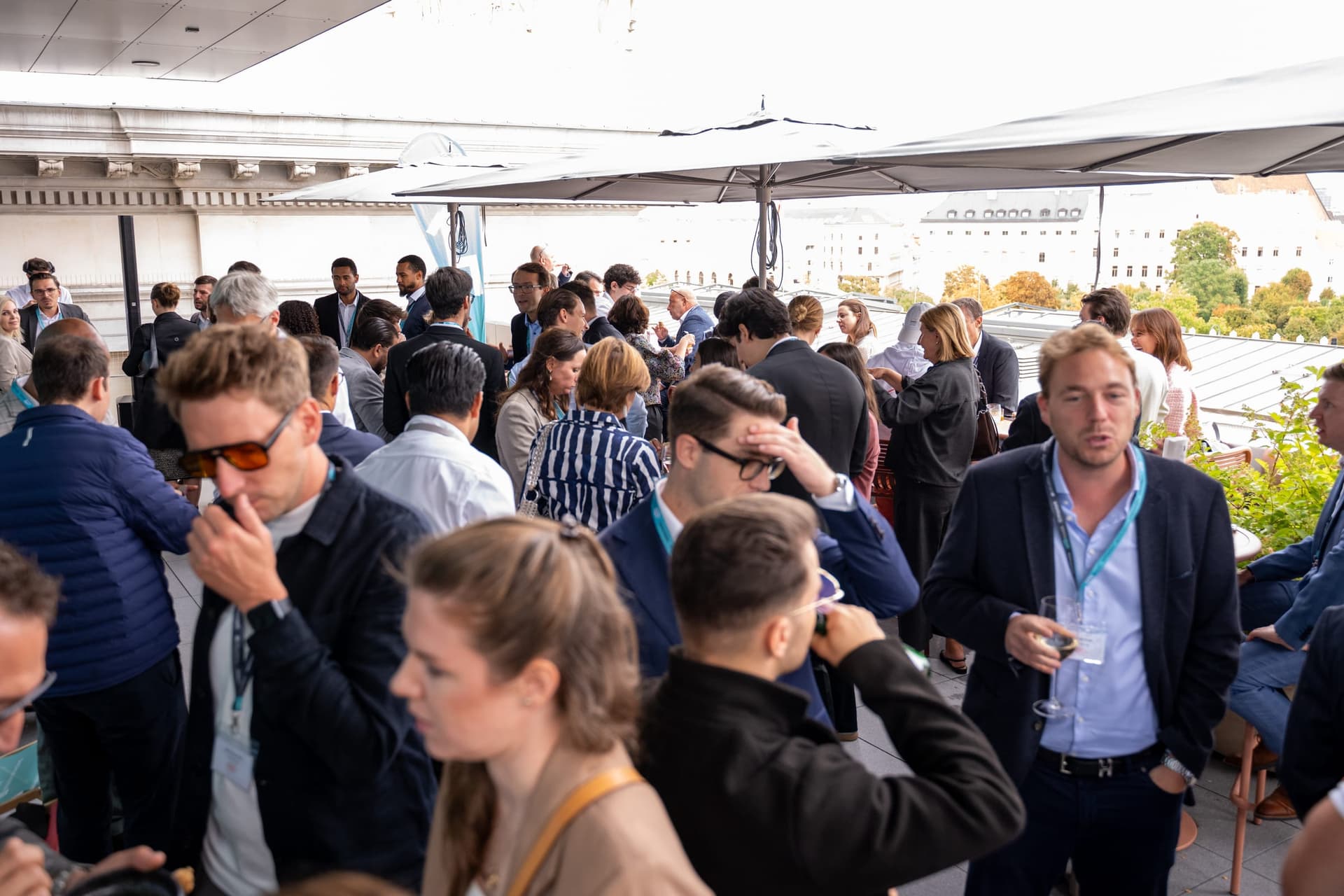 Property developers, financiers and advisers networking on the rooftop terrace