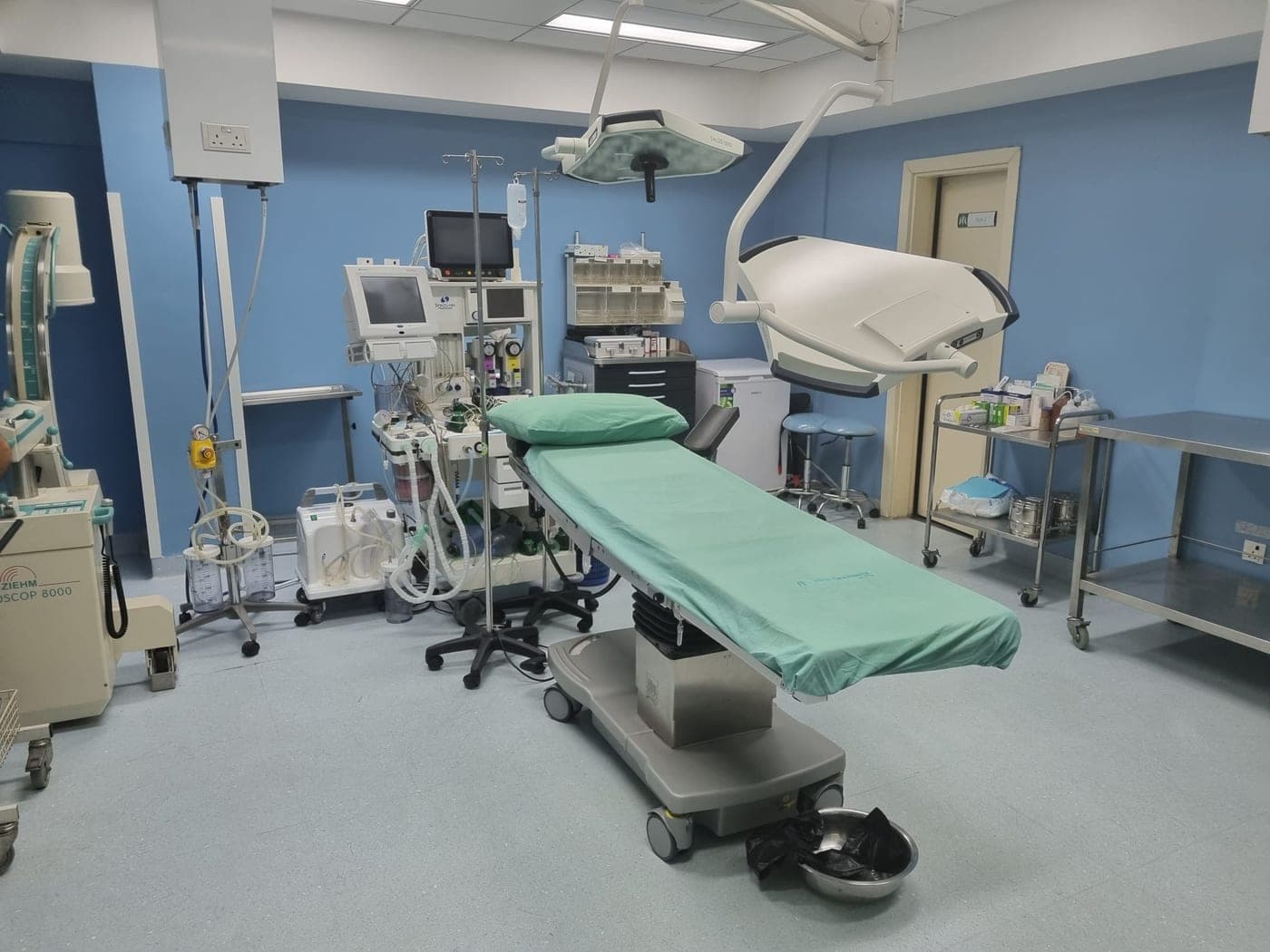 Hospital campus exterior — clinical infrastructure at scale