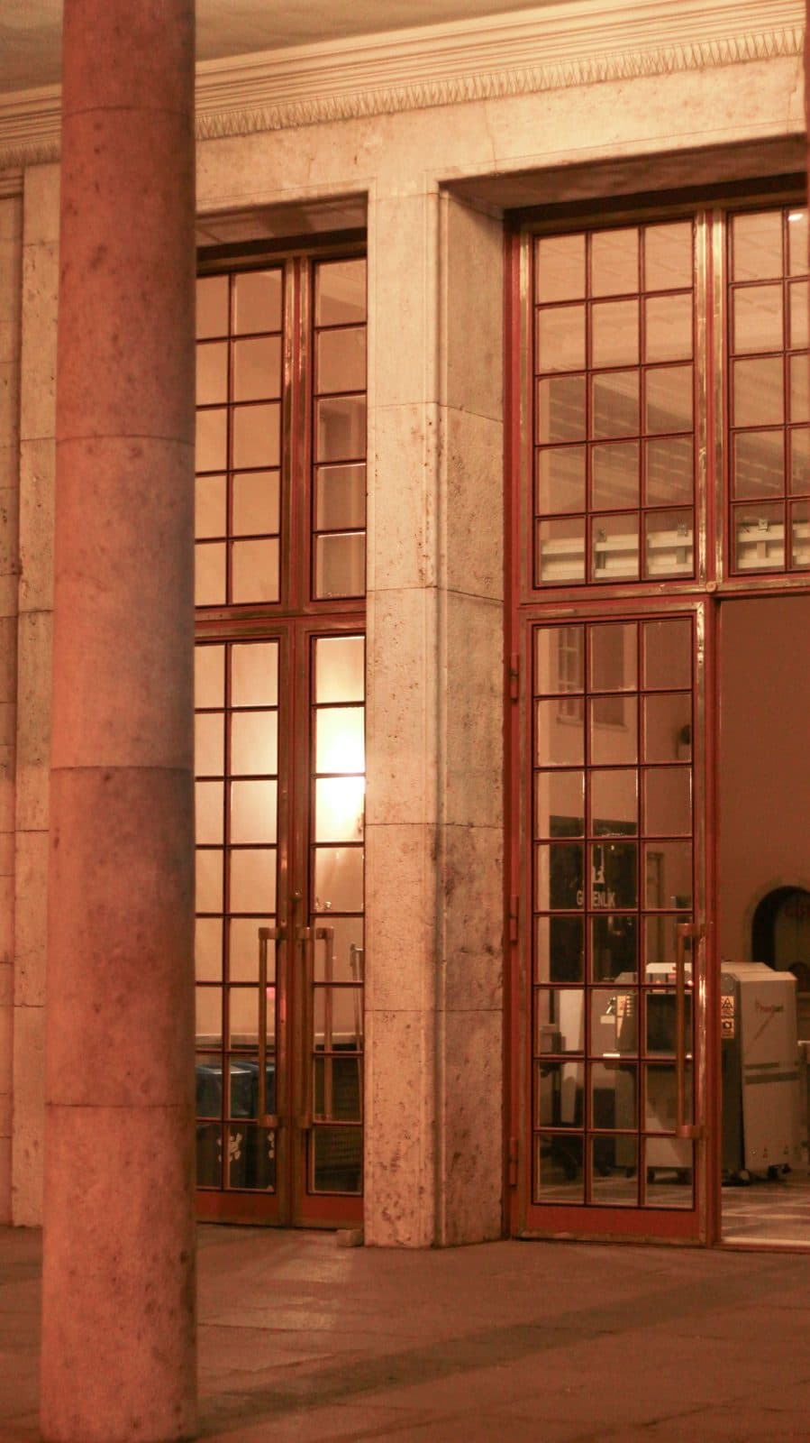 Marble and brass entrance of a classic financial building